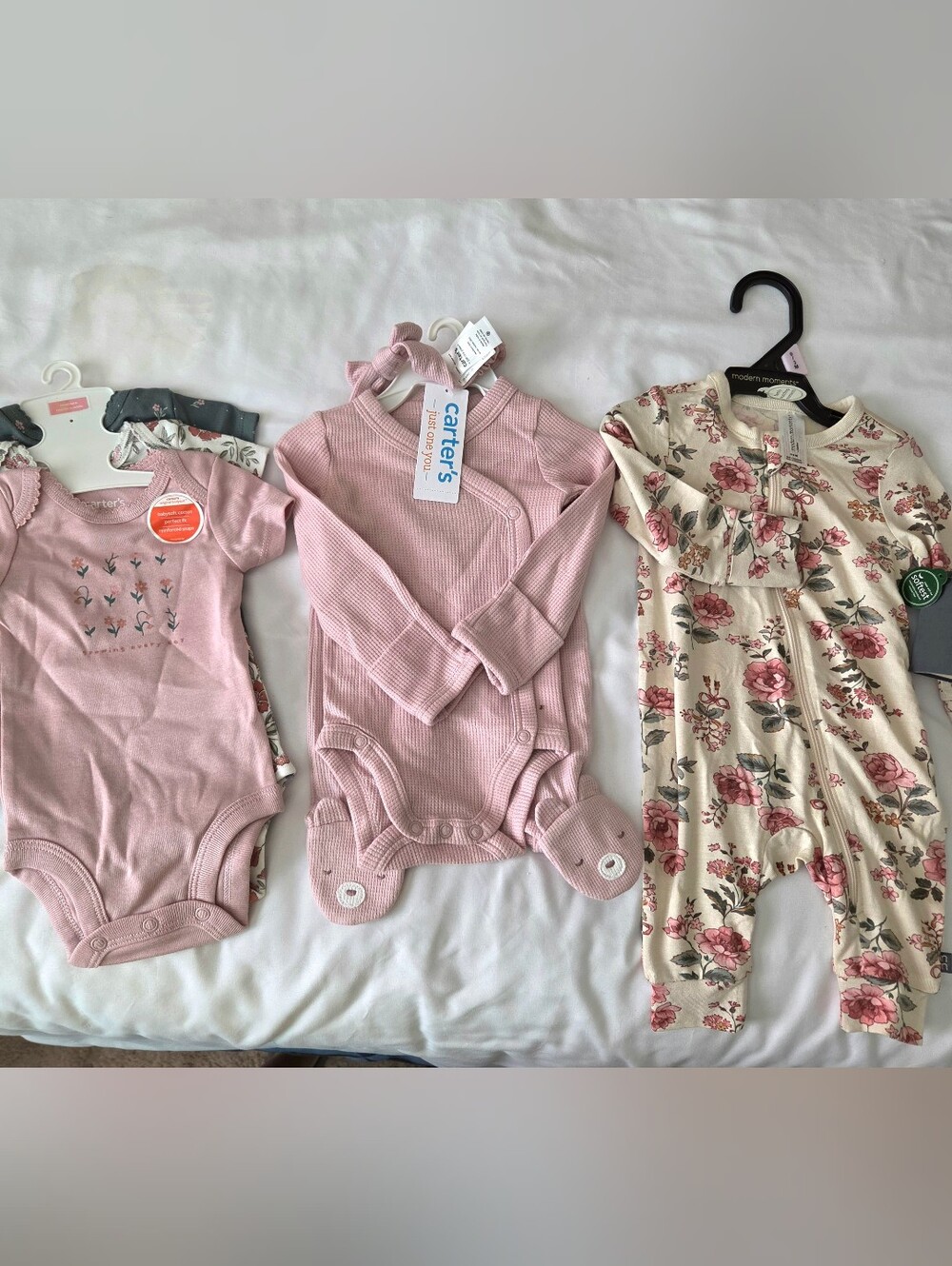 Carter's Pink Ribbed Long-Sleeve Baby Bodysuit with Footies.  0 Newborn